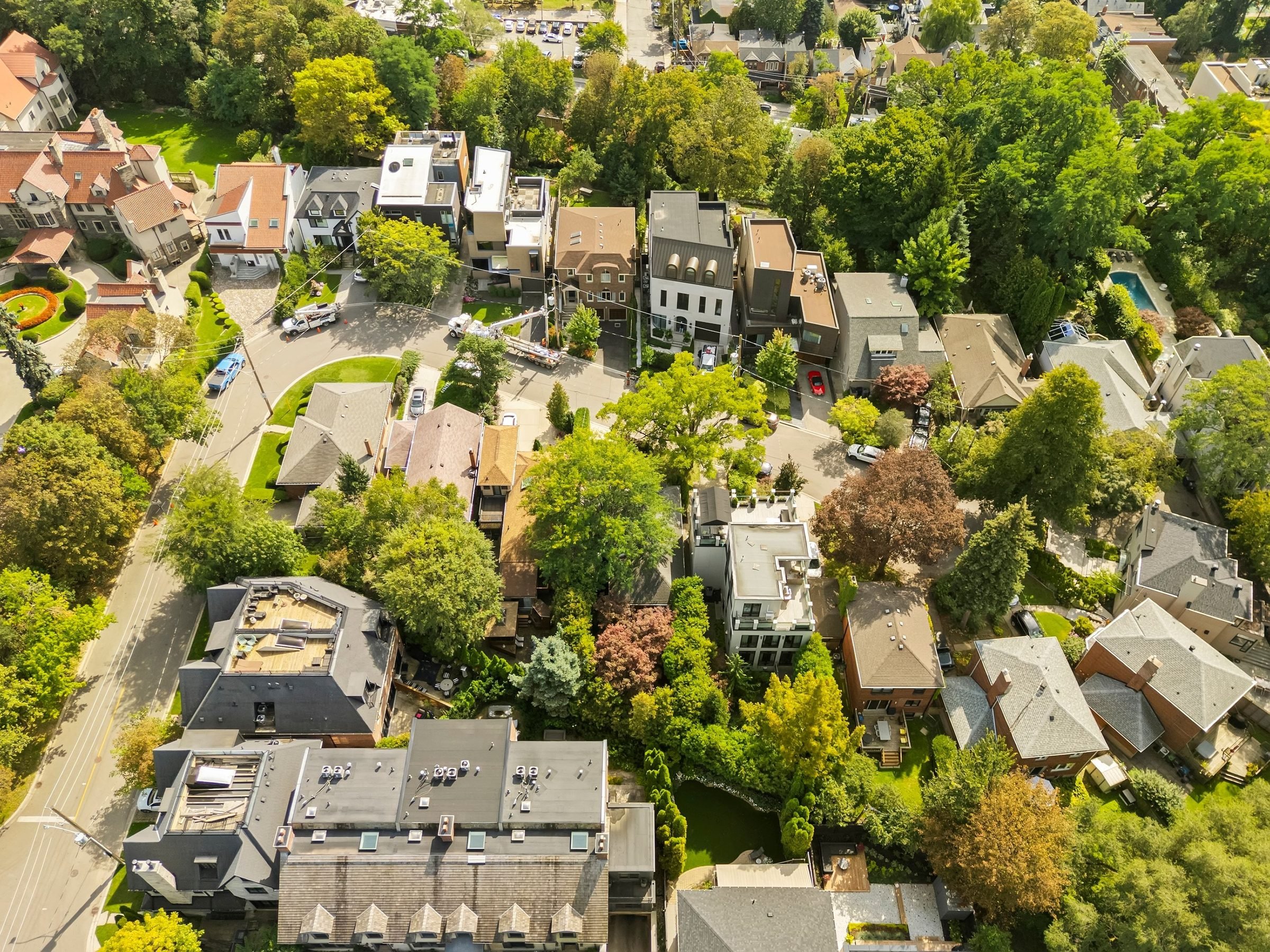 Looking across the Casa Loma plateau: quiet streets under a full canopy of mature trees